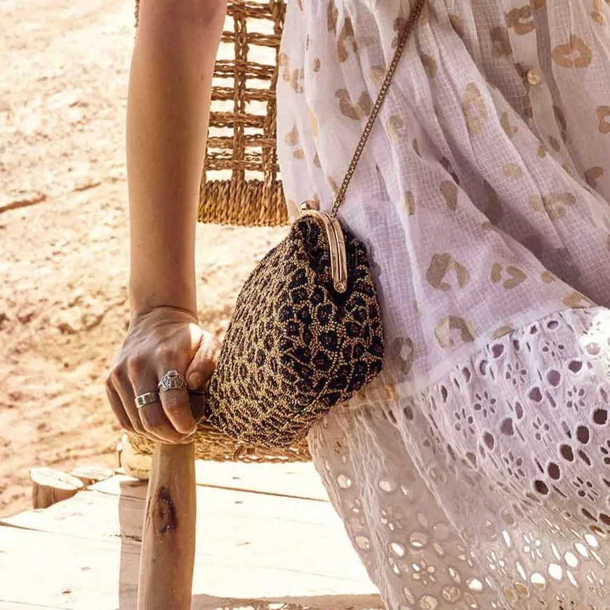 BORSA A SPALLA CON PERLINE LEOPARDO