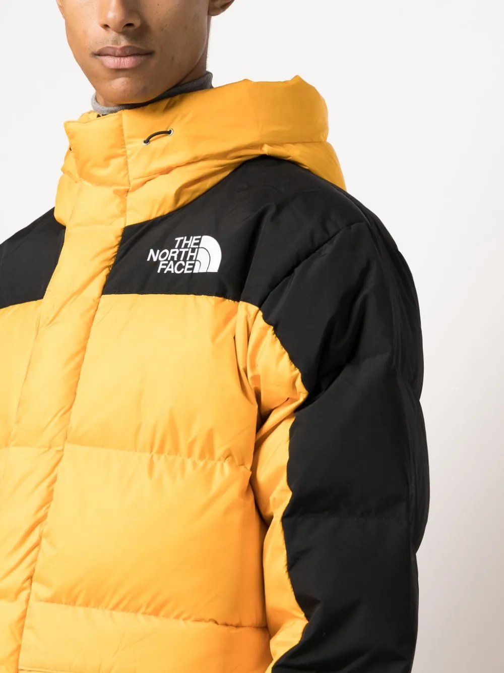 parka giallo con dettagli neri