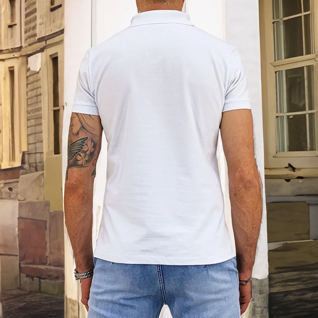 Polo manica corta in colore Bianco
